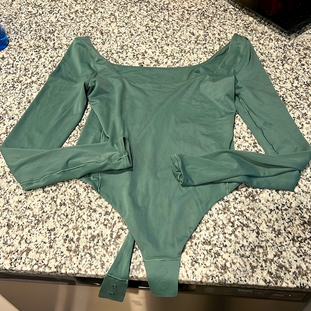Lululemon Wandermost Ultra Soft Bodysuit; size medium; NEVER WORN, but no tags